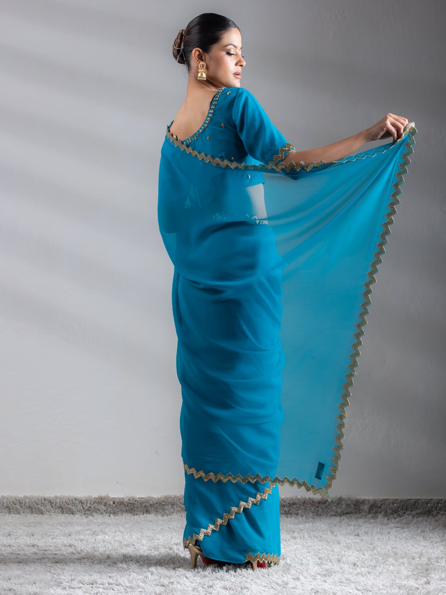 Dhiyona ST Turquoise Sequin Georgette Saree with Blouse Fabric