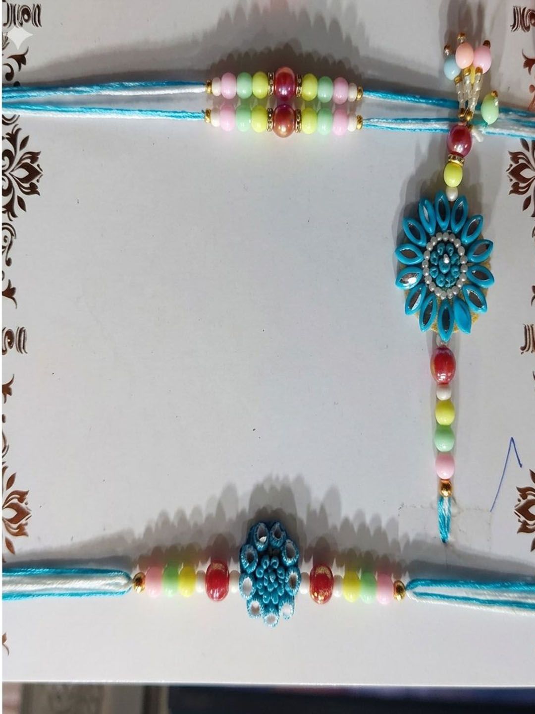 Dhiyona Set Of 4 Family Pack Beaded Thread Rakhi With Roli Chawal Chandan Mishri