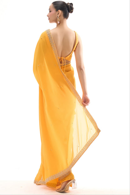 Dhiyona ST Turmeric Yellow Drapy Georgette Saree with Diamonds and Self Blouse Fabric
