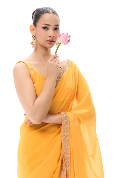 Dhiyona ST Turmeric Yellow Drapy Georgette Saree with Diamonds and Self Blouse Fabric