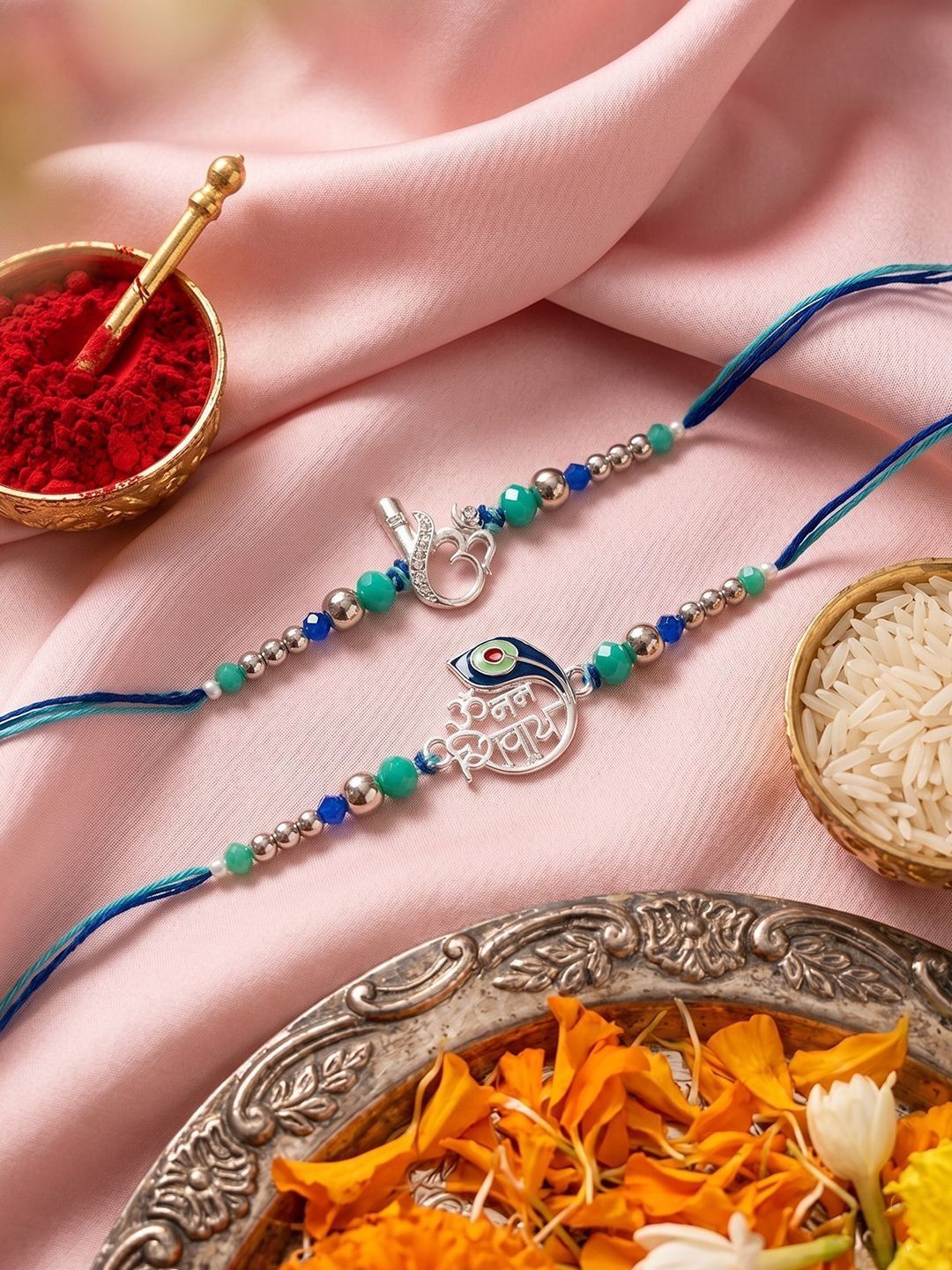 Dhiyona Set Of 2 Silver Toned Beaded Religious Thread Rakhi With Roli Chawal Chandan Mishri