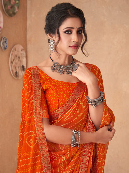 Women's Chiffon Orange Embellished Designer Saree With Blouse Piece