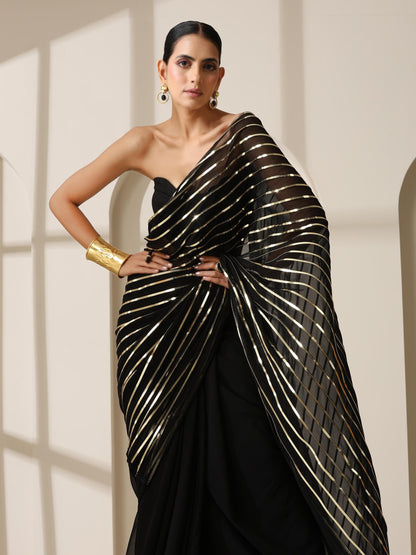 Dhiyona ST Black And Gold Impression Georgette Saree
