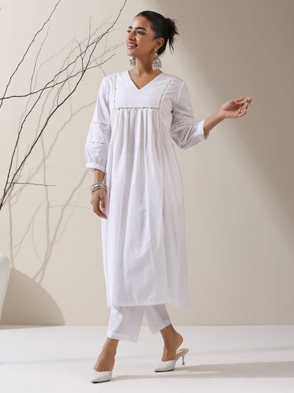 Dhiyona ST 2-Piece White Cotton Bib Kurta Set for Women – Pearl Embellished Detailing with Matching Pants | Elegant Ethnic Co-ord