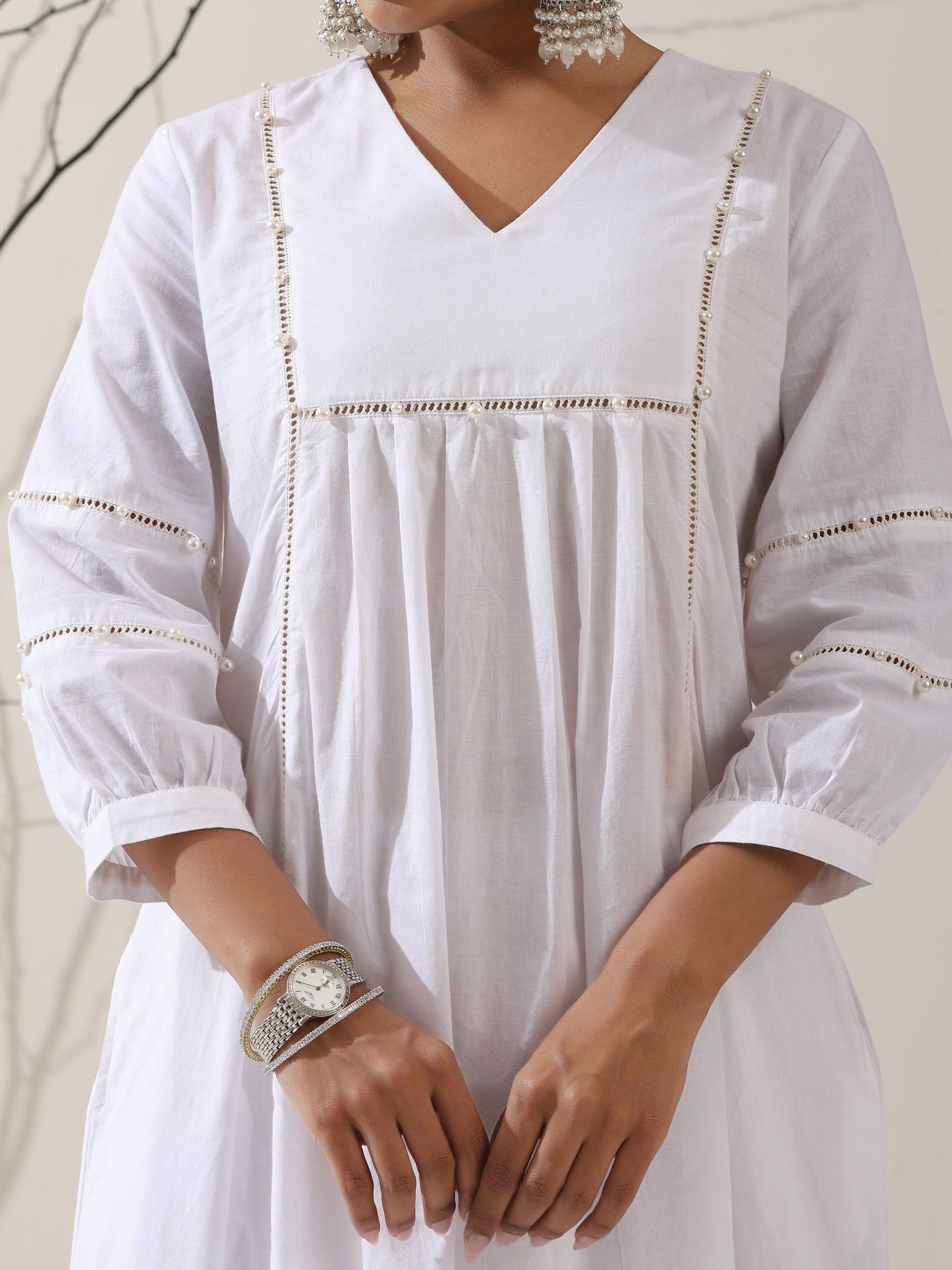 Dhiyona ST 2-Piece White Cotton Bib Kurta Set for Women – Pearl Embellished Detailing with Matching Pants | Elegant Ethnic Co-ord