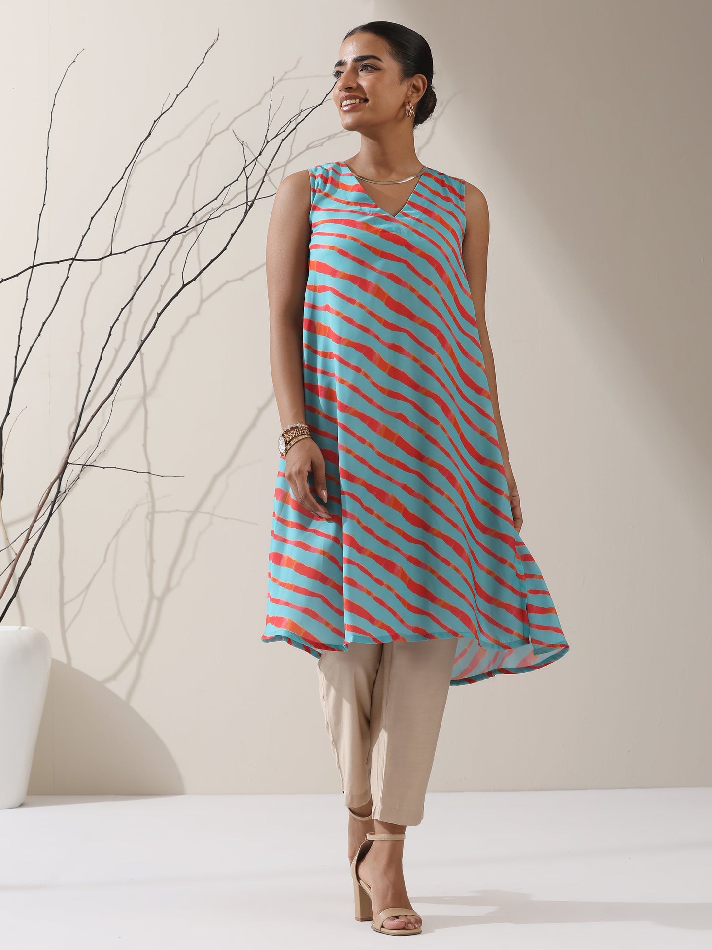 Dhiyona ST Blue-Orange Printed Satin Kurta Set – 2 Pc A-Line Sleeveless with Pants
