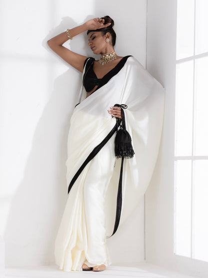 Dhiyona ST Magnolia Cream Satin Saree with Black Posh Border & Blouse Fabric