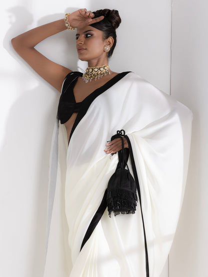 Dhiyona ST Magnolia Cream Satin Saree with Black Posh Border & Blouse Fabric