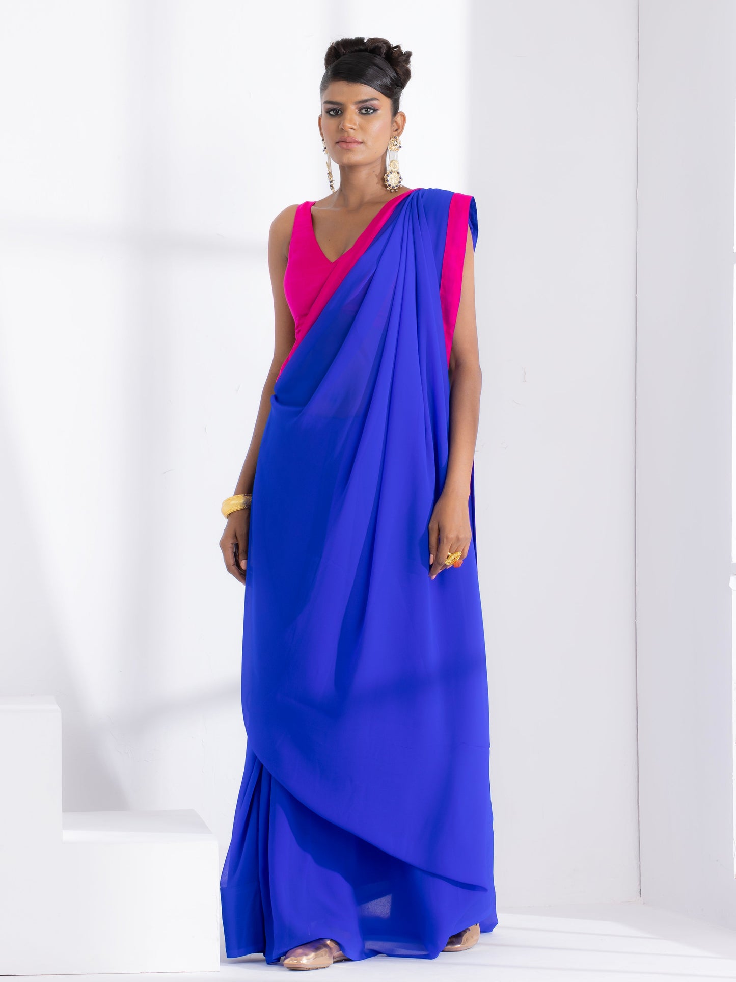 Dhiyona ST Megawatt Blue Georgette Saree with Pink Posh Fabric Border & Blouse Fabric