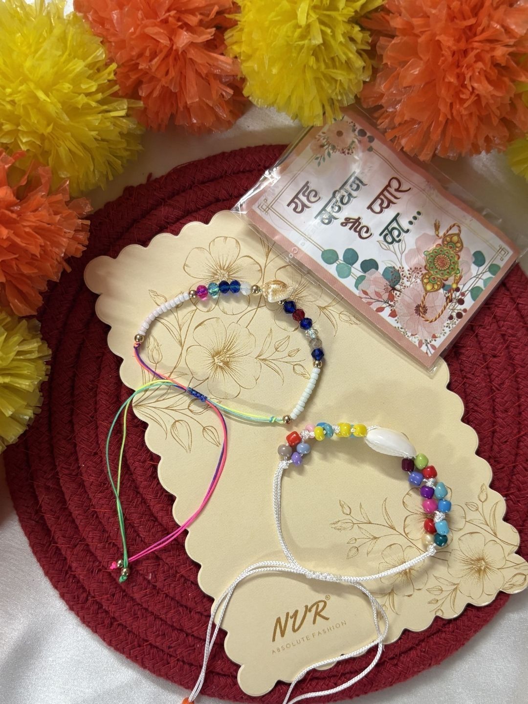 Dhiyona Set Of 2 Artificial Beads Thread Rakhi With Roli Chawal Chandan Mishri