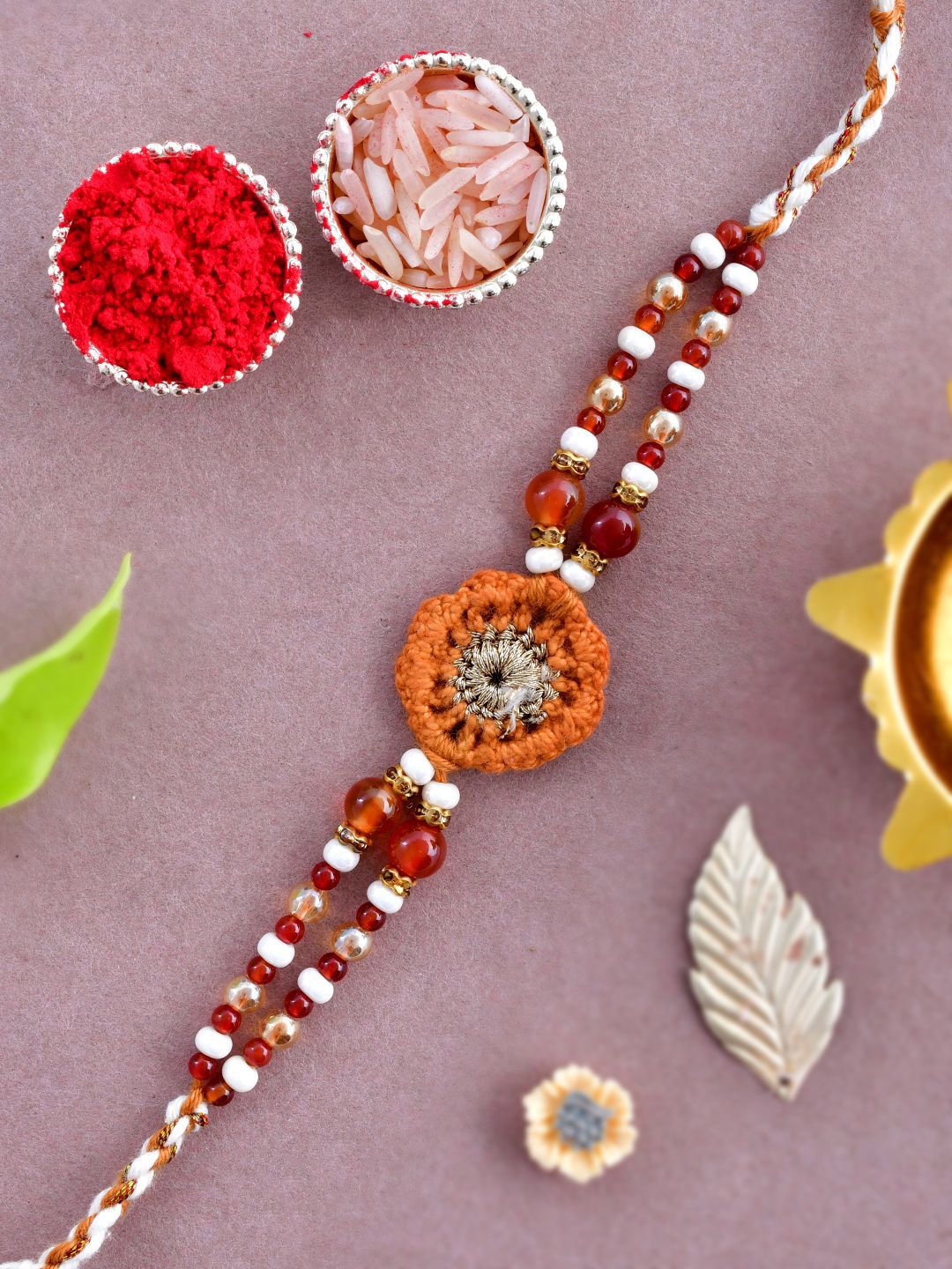 Dhiyona Brown Wool Knitted & Beaded Rakhi With Roli Chawal & Greeting Card