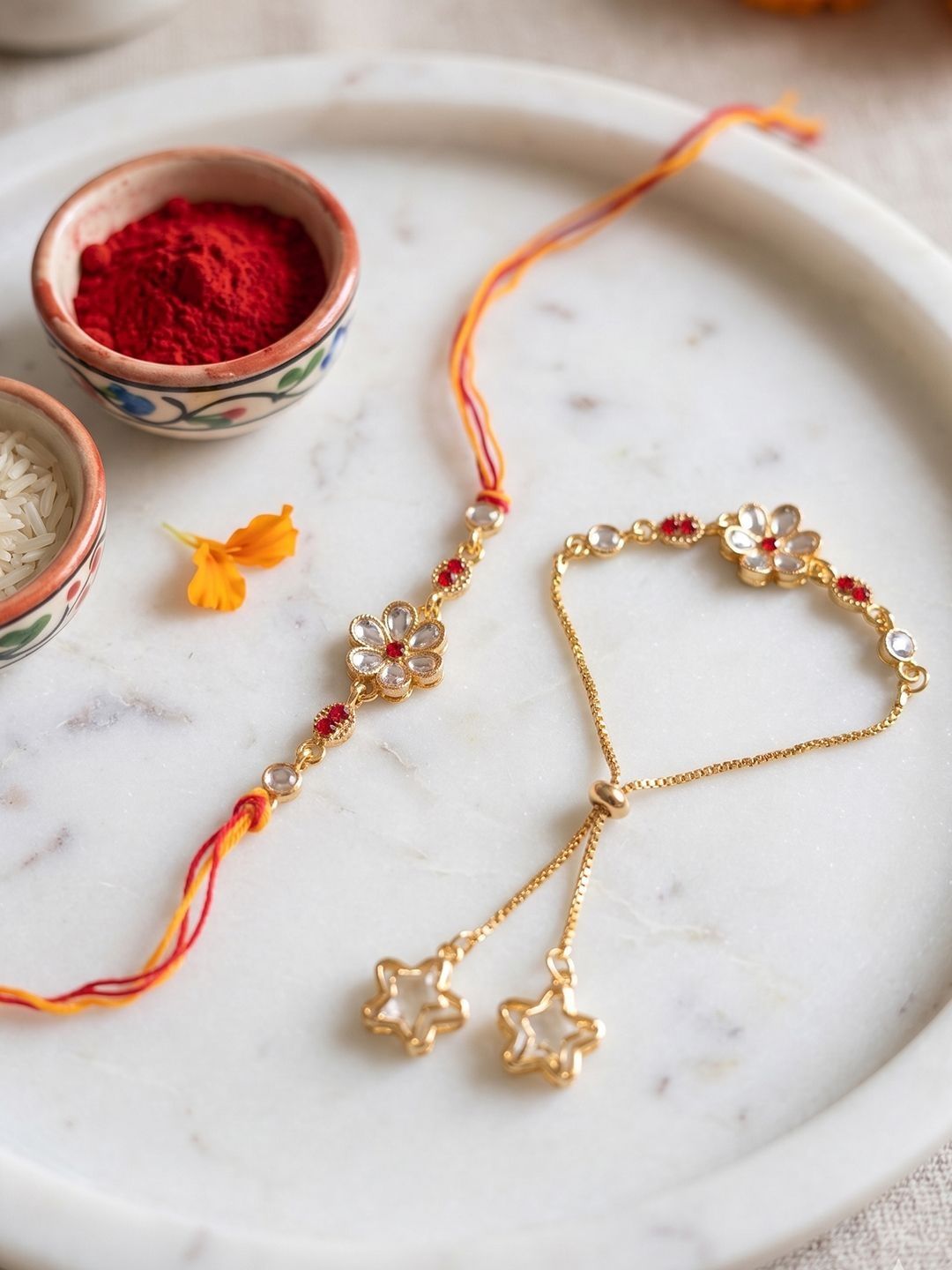 Dhiyona Set Of 2 Gold Toned Kundan Studded Bhaiya Bhabhi Rakhi