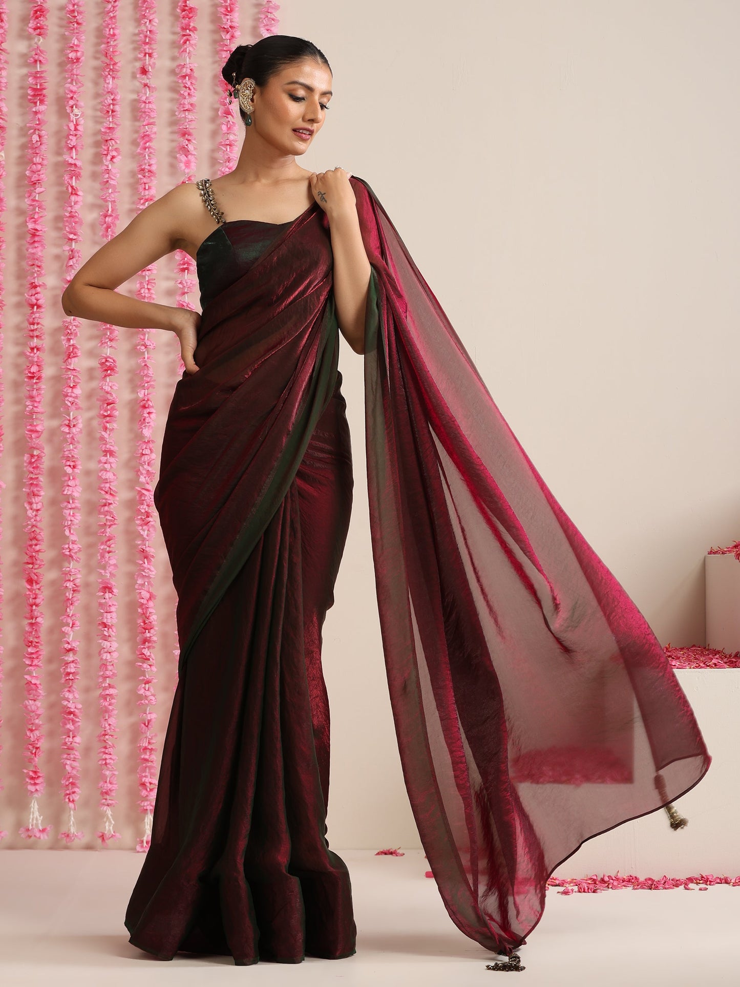 Dhiyona ST Enigmatic Elegance Saree – Dual-Shade Maroon-Green Metallic Satin with Pendants & Self Blouse Fabric