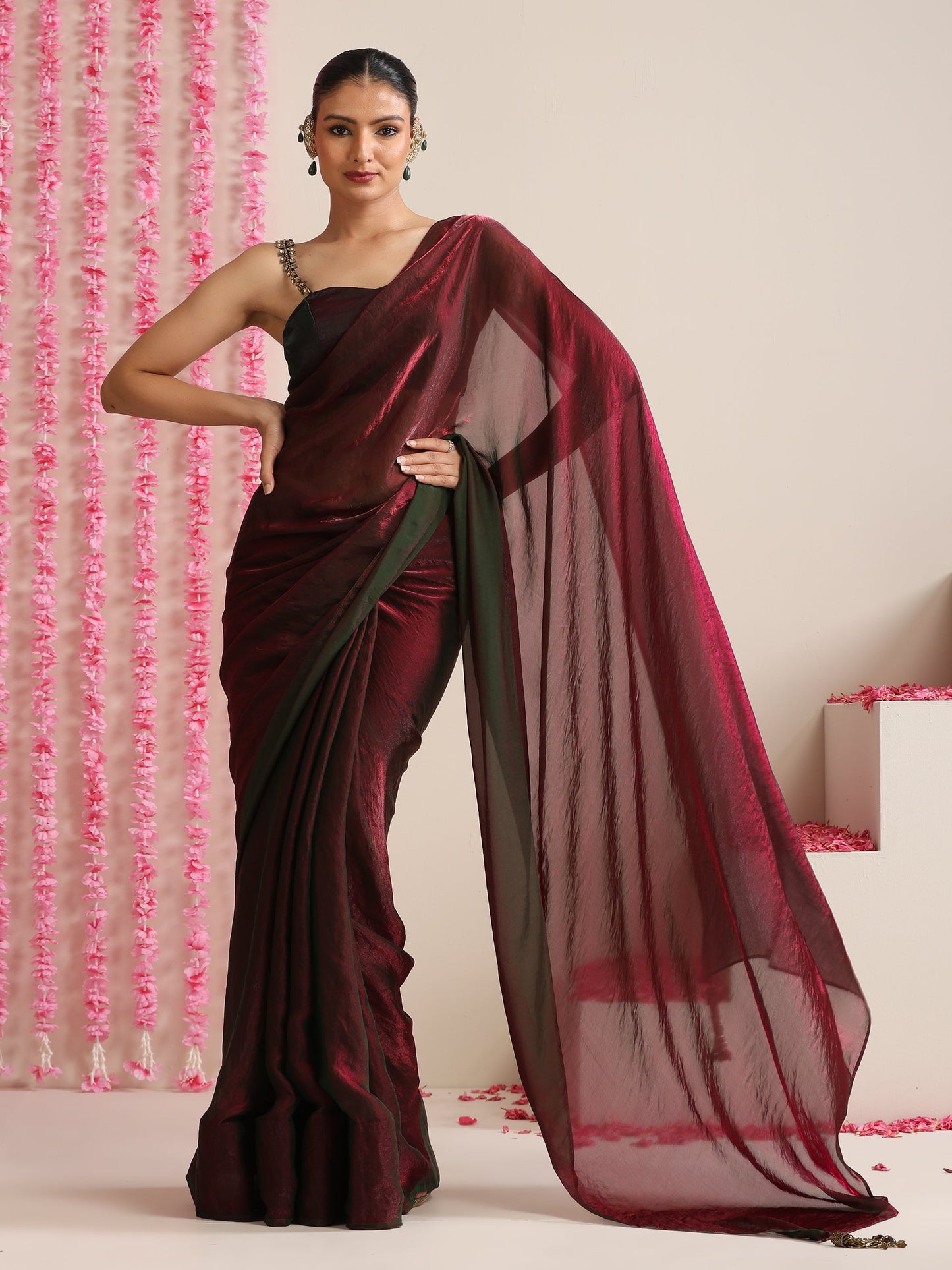 Dhiyona ST Enigmatic Elegance Saree – Dual-Shade Maroon-Green Metallic Satin with Pendants & Self Blouse Fabric