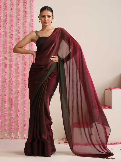 Dhiyona ST Enigmatic Elegance Saree – Dual-Shade Maroon-Green Metallic Satin with Pendants & Self Blouse Fabric