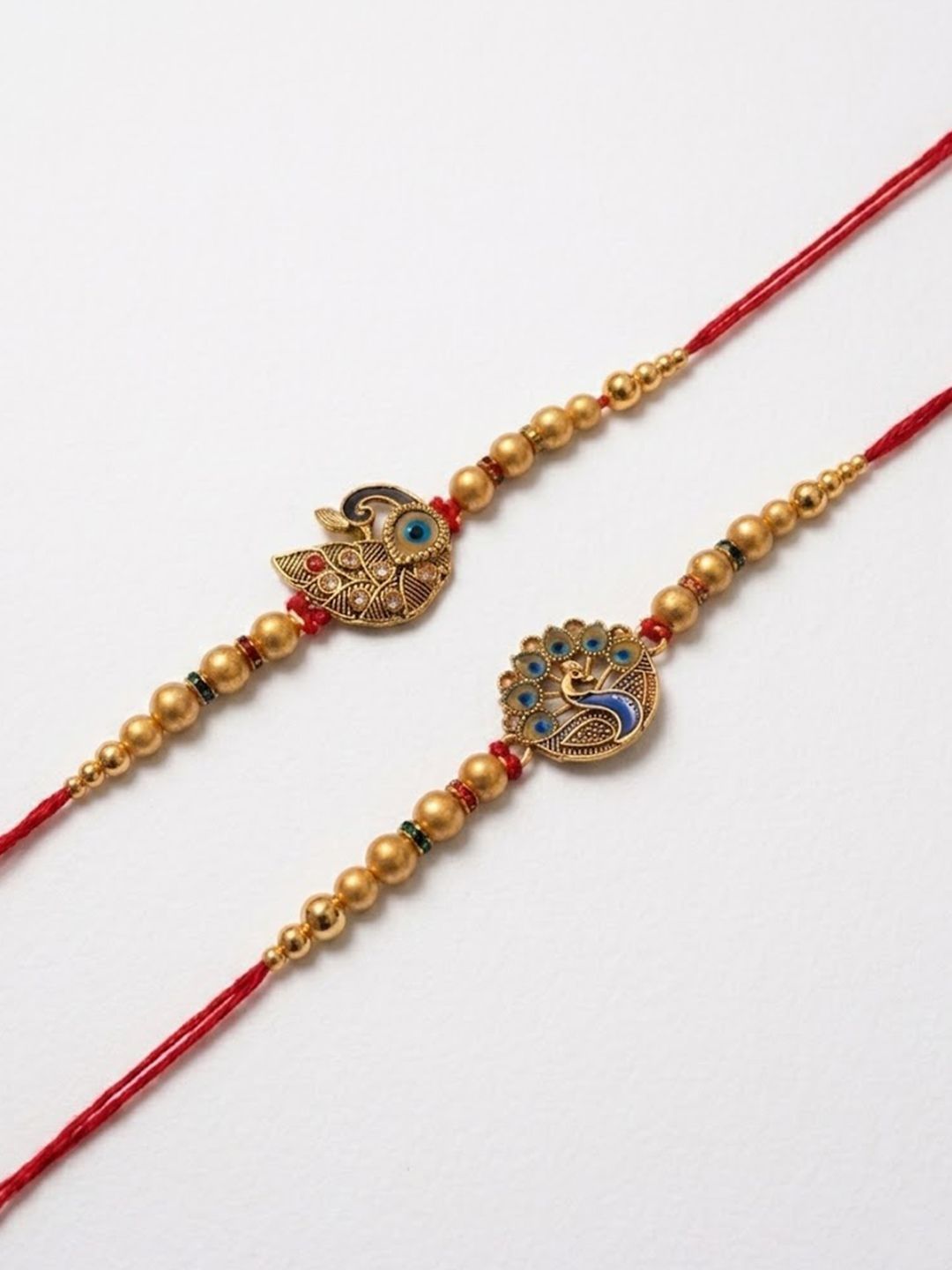 Dhiyona Set Of 2 Peacock & Ghungroo Design Multicolor Thread Rakhi With Roli Chawal Chandan