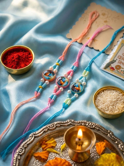 Dhiyona Set Of 3 Radha Krishna Thread Rakhi With Roli Chawal Chandan Mishri