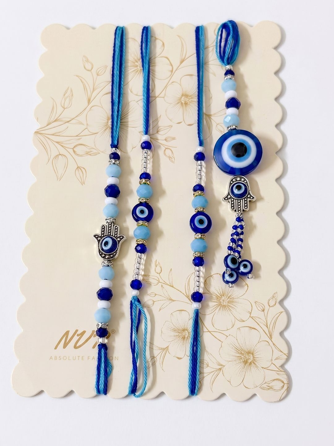 Dhiyona Set Of 4 Designer Blue Evil Eye Thread Rakhi With Roli Chawal Chandan Mishri