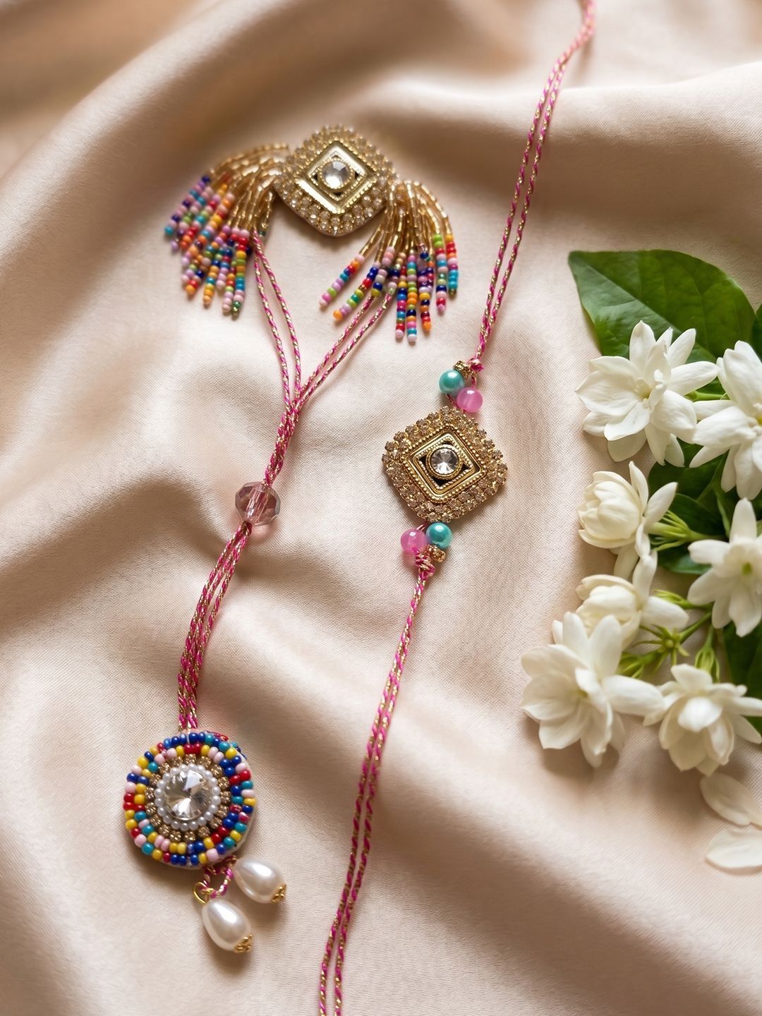 Dhiyona Set Of 2 White Artificial Stones Golden Toned Bhaiya Bhabhi Rakhi With Roli Chawal