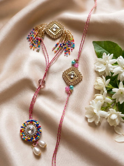 Dhiyona Set Of 2 White Artificial Stones Golden Toned Bhaiya Bhabhi Rakhi With Roli Chawal