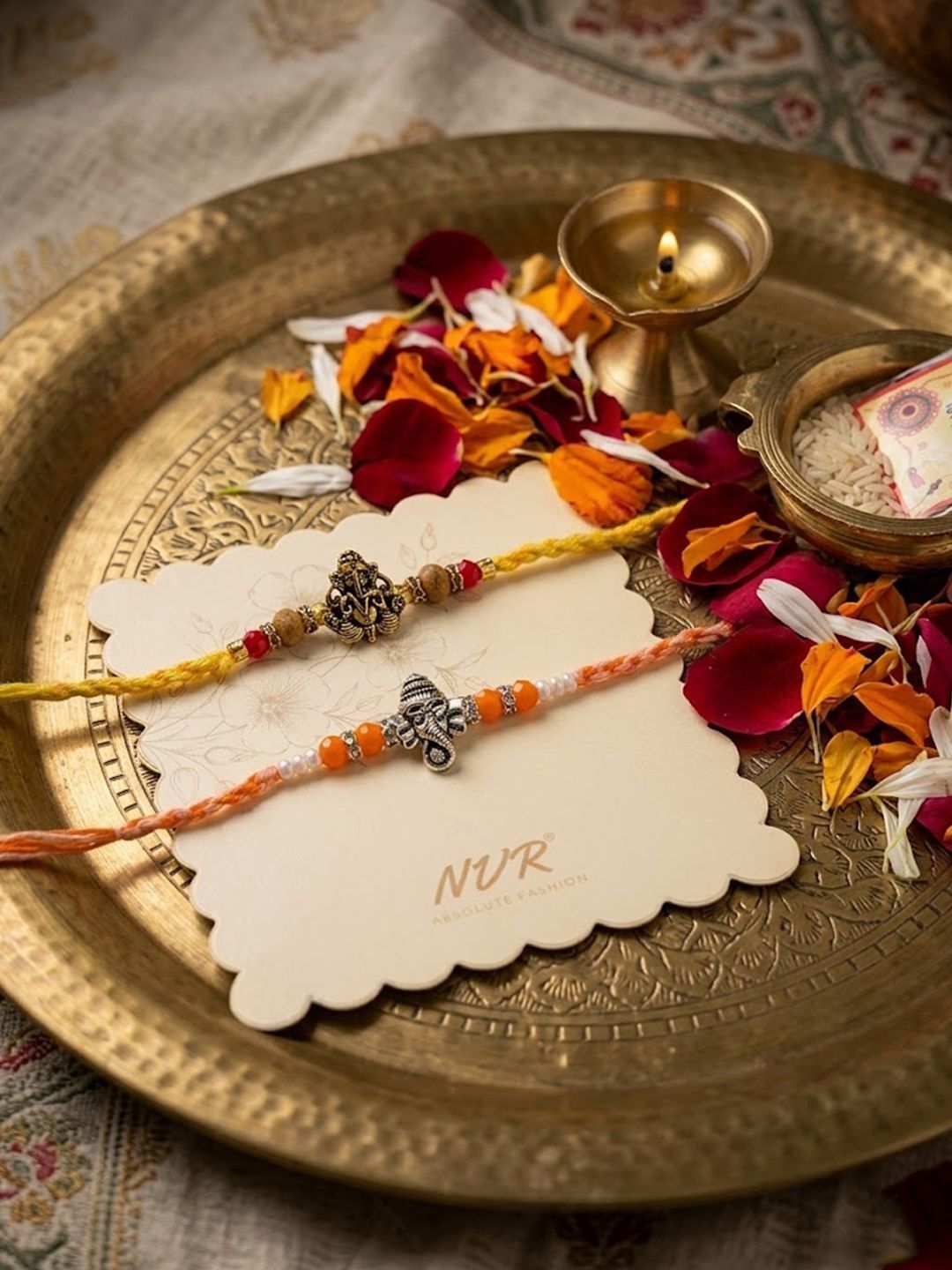 Dhiyona Set Of 2 Multicolor Religious Thread Rakhi With Roli Chawal Chandan Mishri