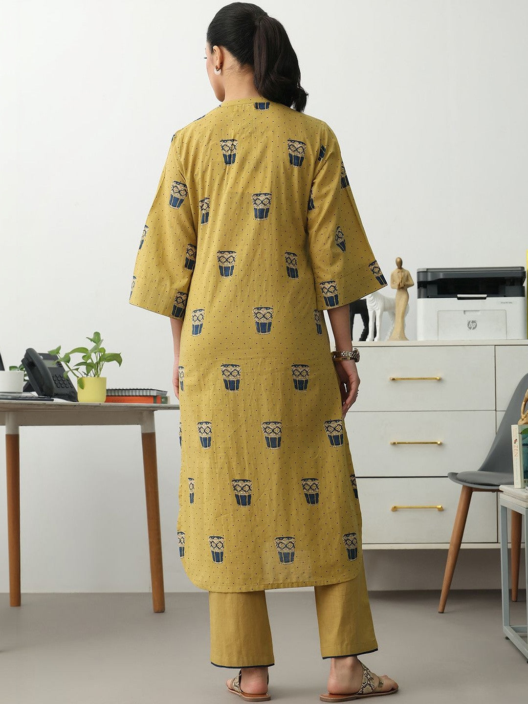 Women Ethnic Motifs Printed Regular Cotton Blend Kurta with Trousers