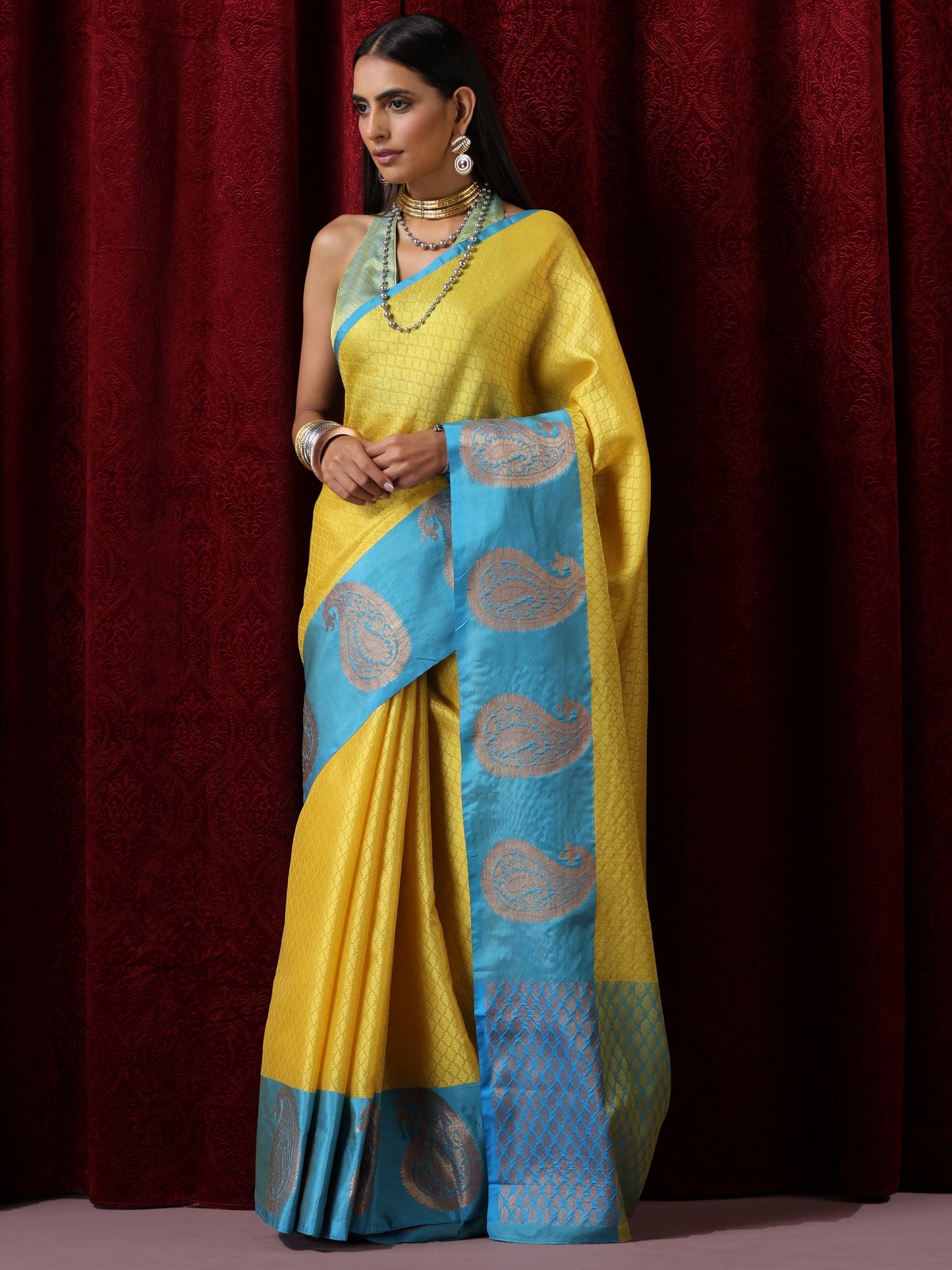 Dhiyona ST Yellow Jacquard Saree with Blue Border with Blouse Fabric