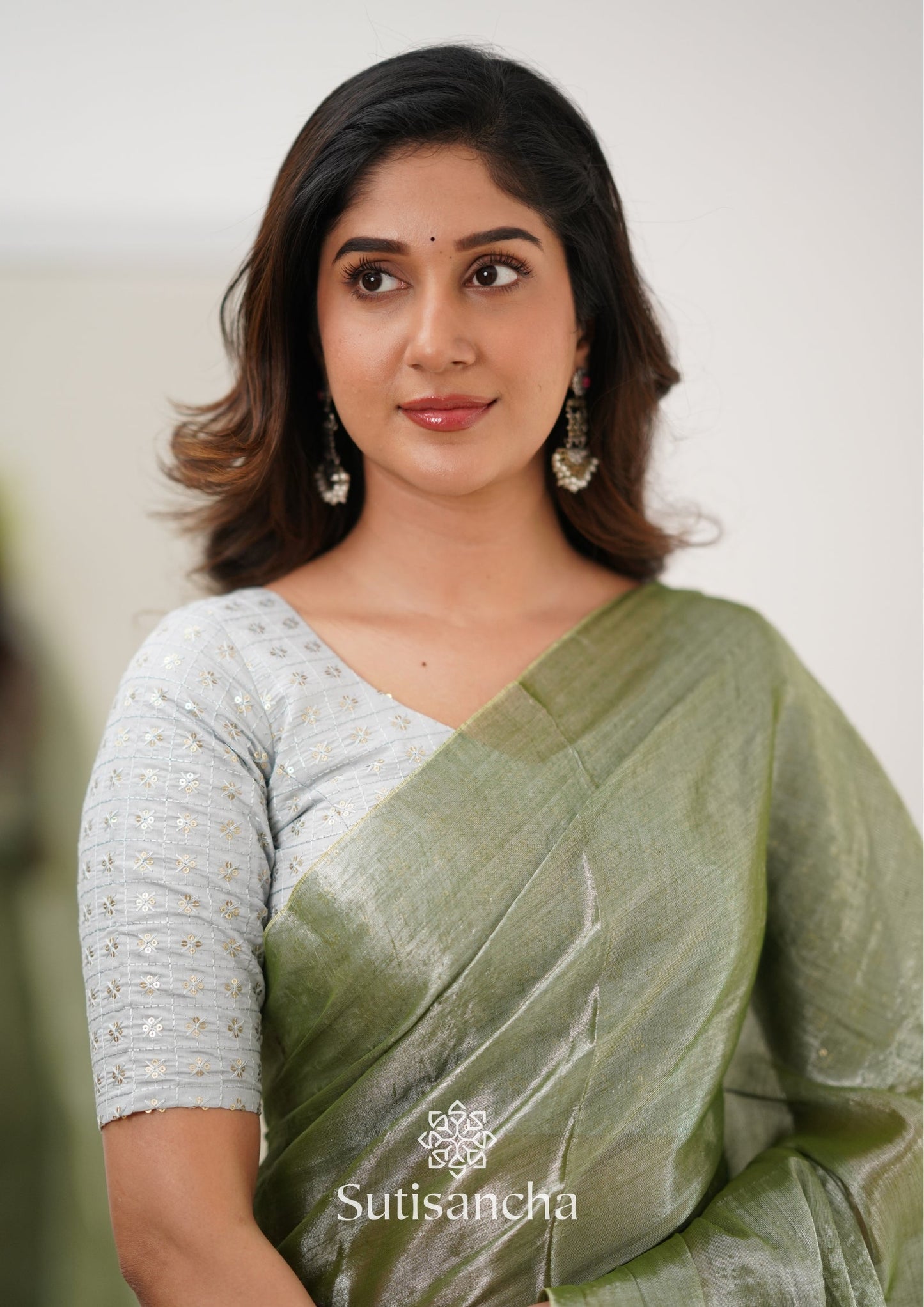 Dhiyona SS Sutisancha Olive Green Handloom Tissue Saree With Designer Blouse