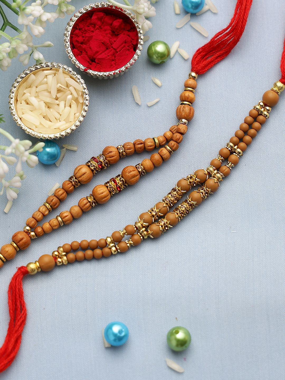 Dhiyona Set Of 2 Brown Beaded Rakhi With Roli Rice & Greeting Card