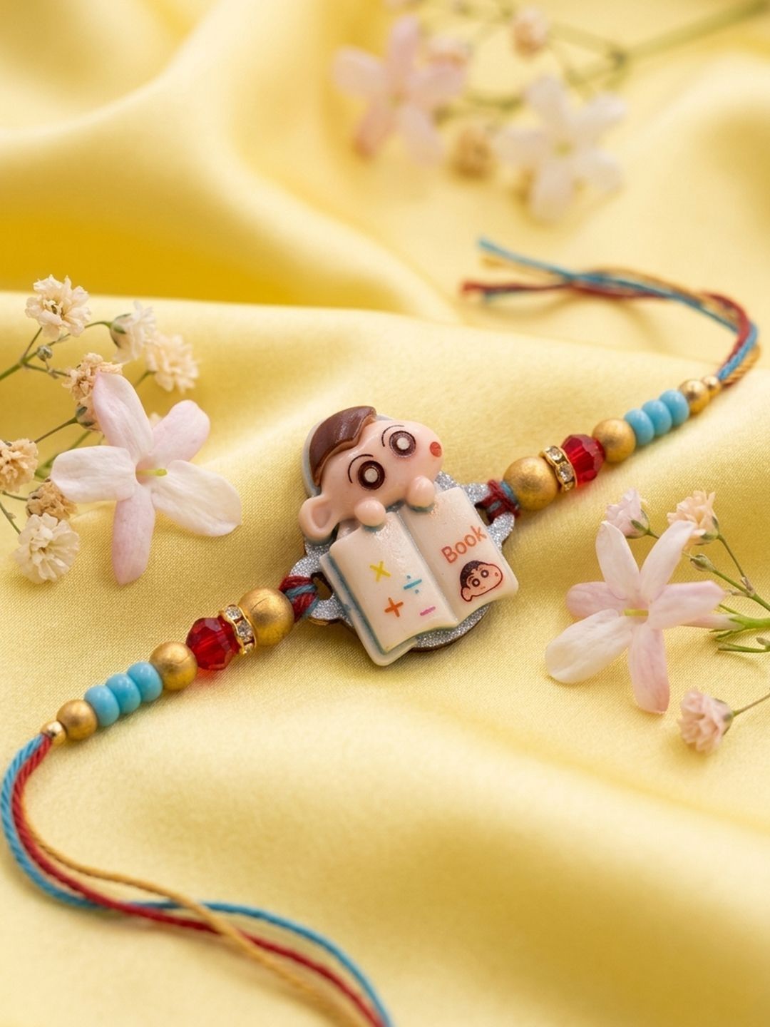 Dhiyona Kids Shinchan Character Artificial Beads Thread Rakhi