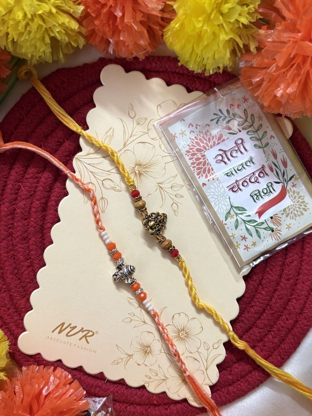 Dhiyona Set Of 2 Multicolor Religious Thread Rakhi With Roli Chawal Chandan Mishri