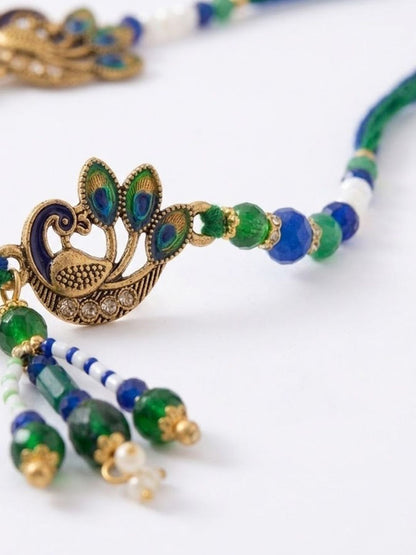 Dhiyona Set Of 4 Green Peacock Design Artificial Beads Thread Rakhi With Roli Chawal