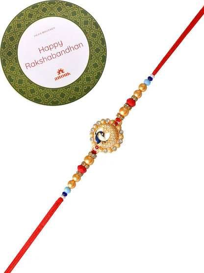 Dhiyona Gold Toned Beaded Peacock Patterned Rakhi With Roli Chawal & Greeting Card