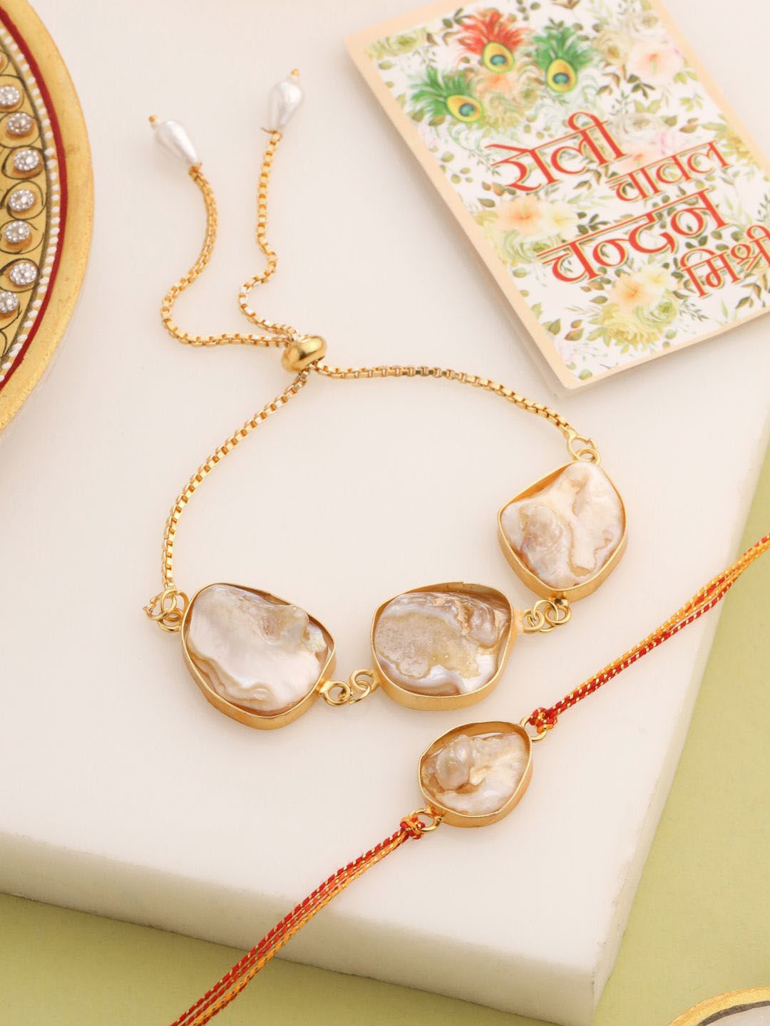 Dhiyona Set Of 2 Gold Toned Pearls Bhaiya Bhabhi Rakhi With Roli Chawal Chandan Mishri