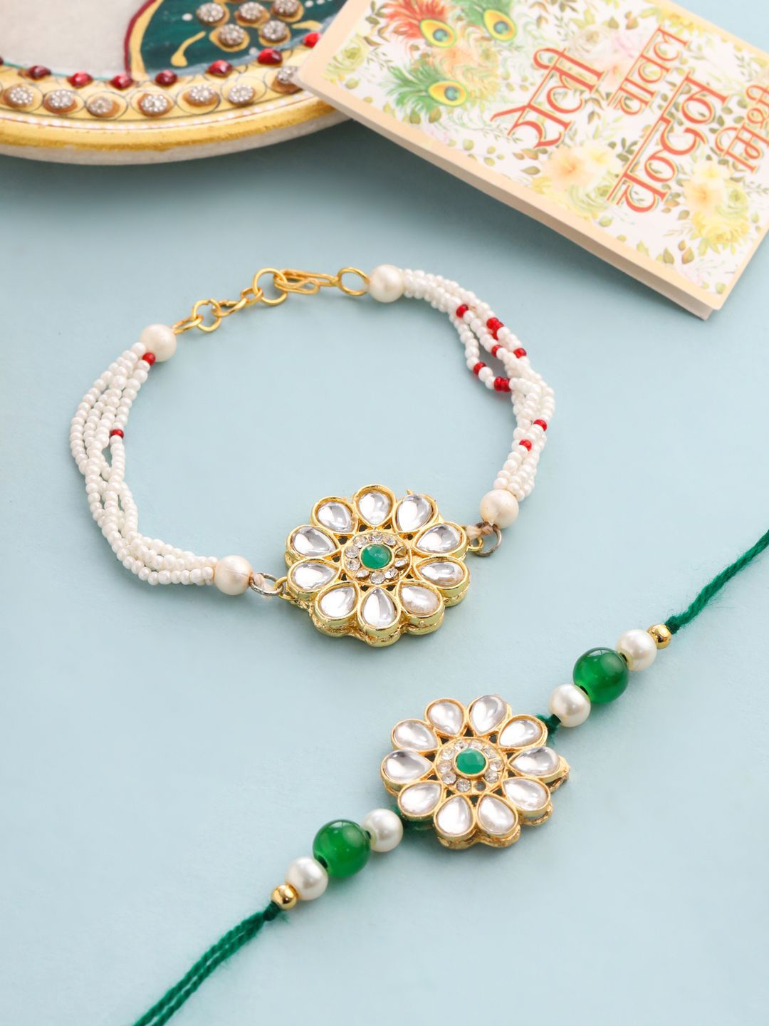 Dhiyona Set Of 2 Kundan Floral Design Gold Toned Bhaiya Bhabhi Rakhi Set With Roli Chawal
