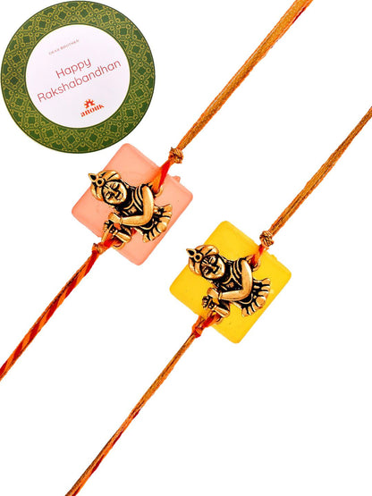 Dhiyona Set Of 2 Red Kanhaiya Rakhis With Roli Chawal & Greeting Card