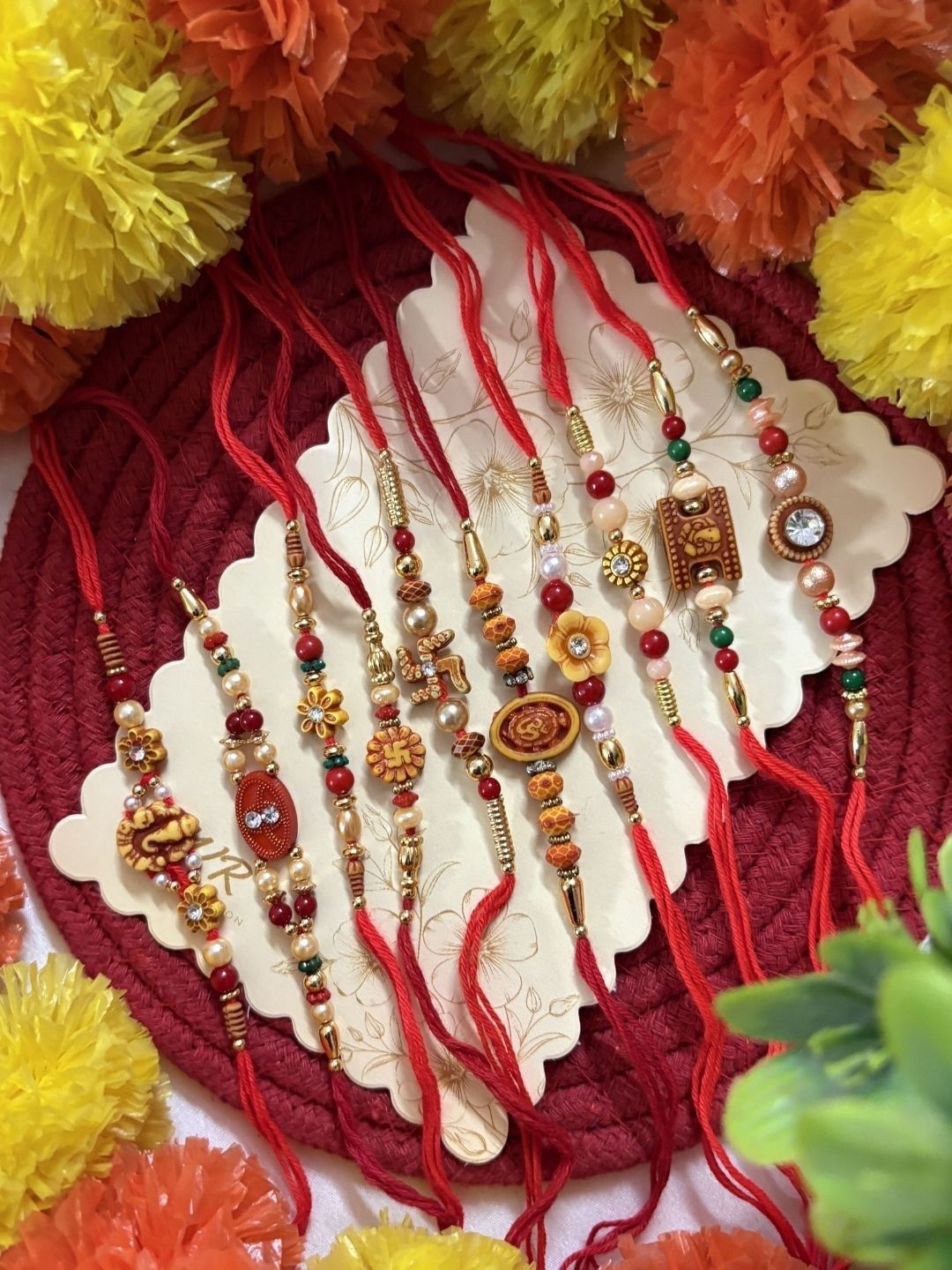 Dhiyona Set Of 10 Multicolor Designer Thread Rakhi With Roli Chawal Chandan Mishri