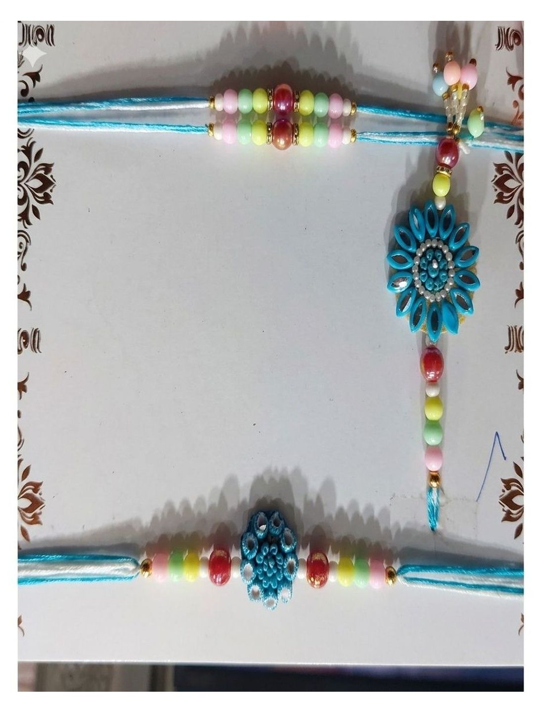 Dhiyona Set Of 4 Family Pack Beaded Thread Rakhi With Roli Chawal Chandan Mishri