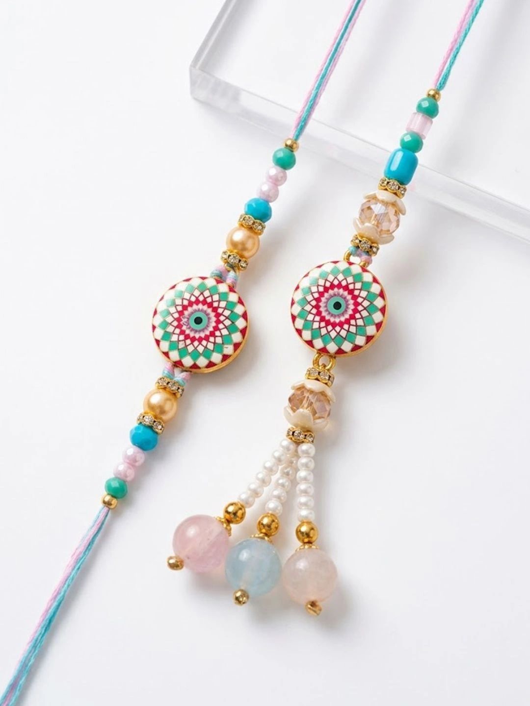 Dhiyona Set Of 2 Floral Design Bhaiya Bhabhi Rakhi With Roli Chawal Chandan Mishri