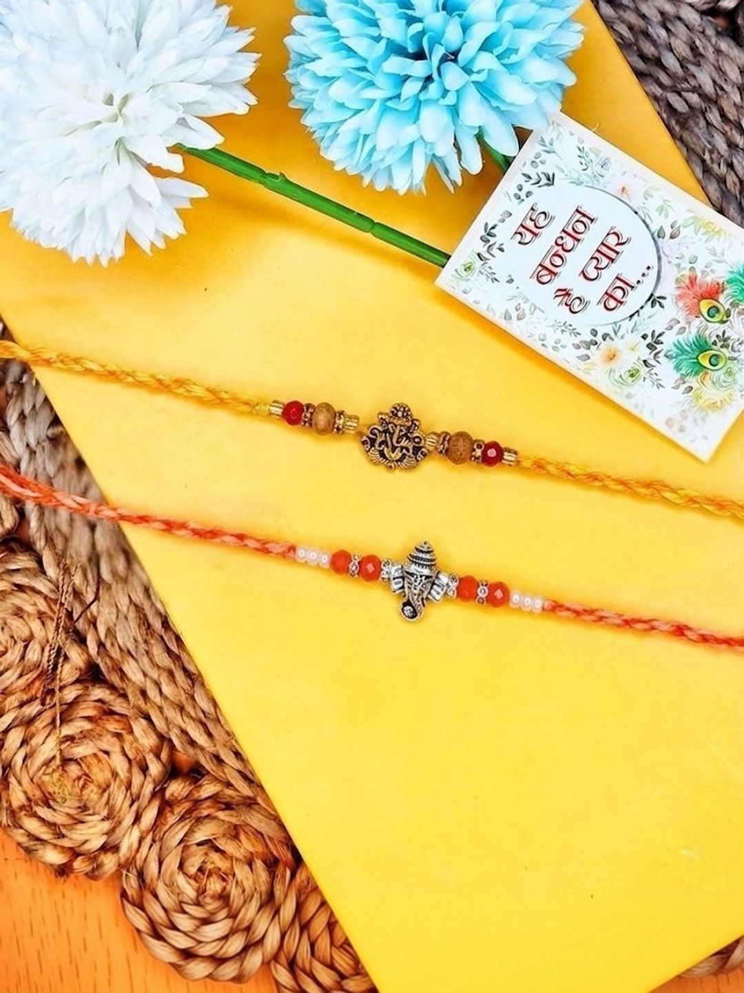 Dhiyona Set Of 2 Multicolor Religious Thread Rakhi With Roli Chawal Chandan Mishri