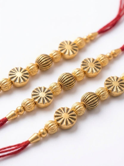 Anouk Set Of 3 Red & Gold Toned Artificial Stones & Beads Thread Rakhi With Roli Chawal