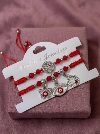 Dhiyona Set Of 2 Red & Silver Evil Eye Design Bhaiya Bhabhi Rakhi With Roli Chawal Chandan