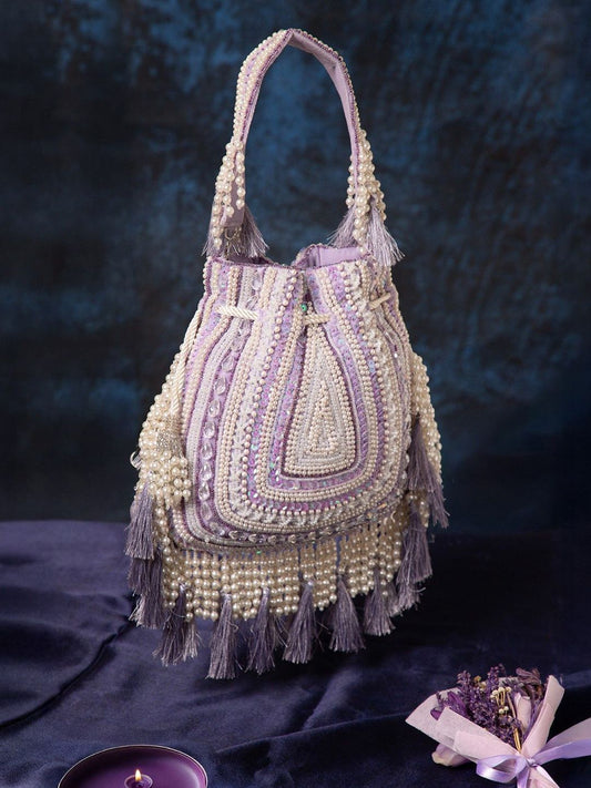 Dhiyona NR Women Embellished Tasselled Potli Clutch