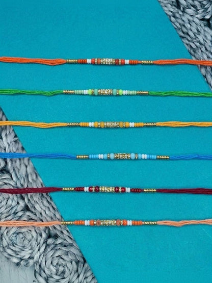 Dhiyona Set Of 6 Multi Artificial Beads Thread Rakhi With Roli Chawal Chandan Mishri