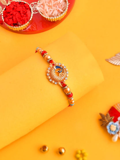 Dhiyona Gold Toned Beaded Peacock Patterned Rakhi With Roli Chawal & Greeting Card