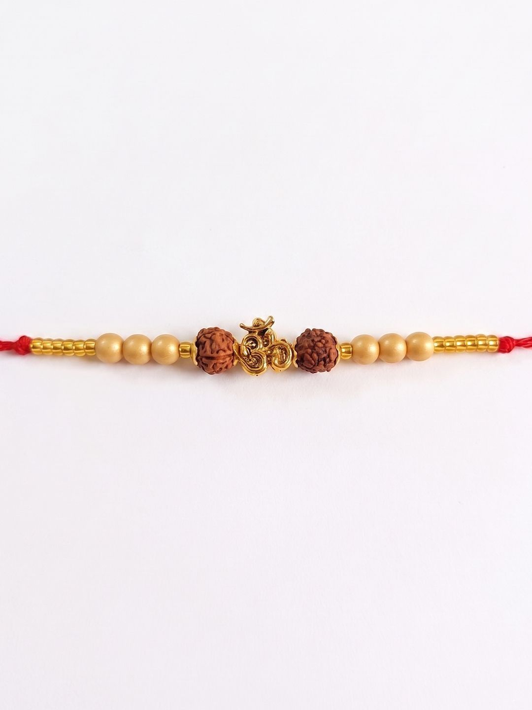 Dhiyona Om Design Rudraksh Thread Rakhi With Roli Chawal Chandan Mishri