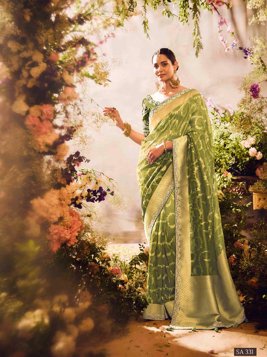 Dhiyona KM Women Green Silk Saree