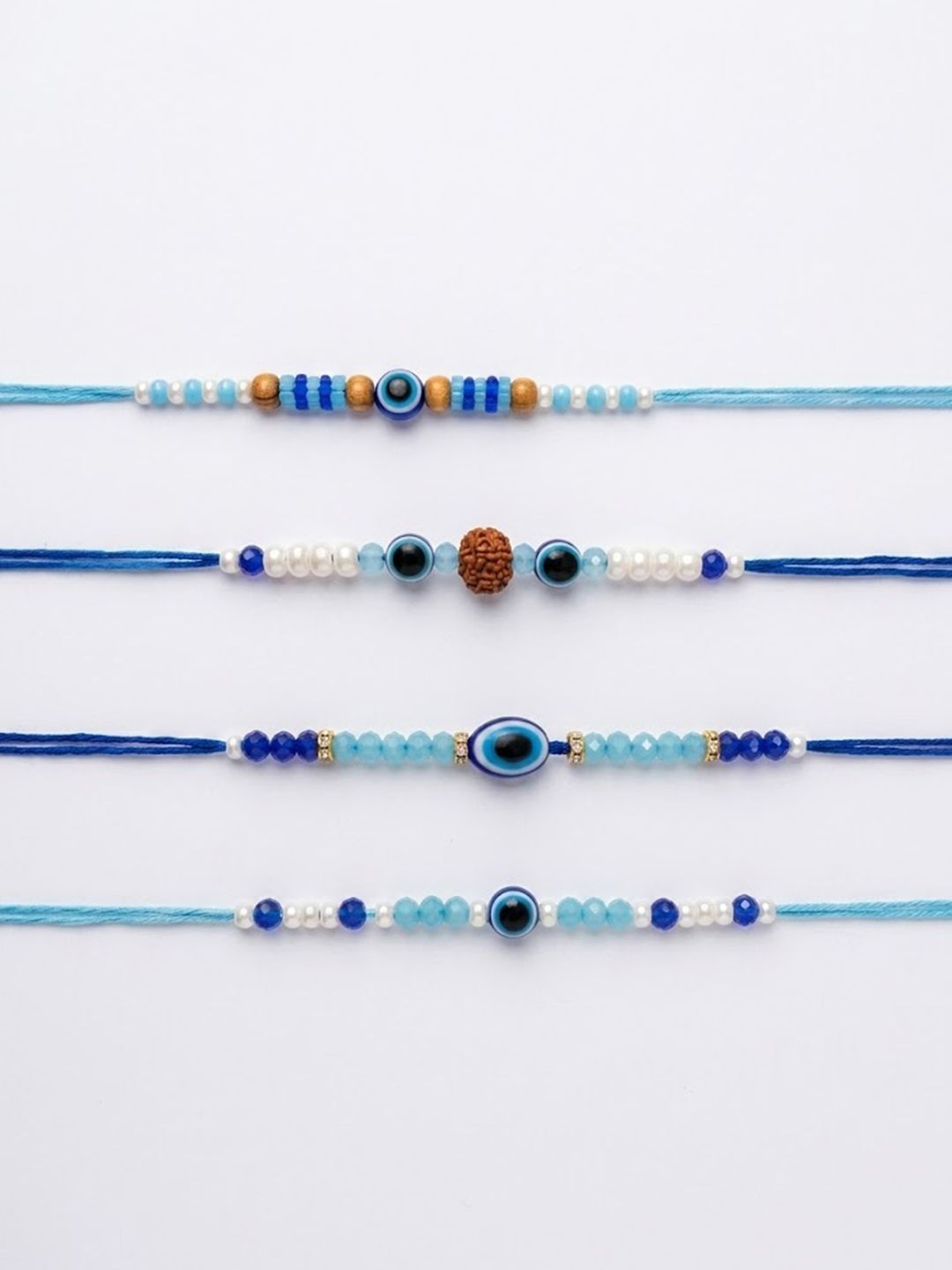 Dhiyona Set Of 4 Blue Evil Eye Thread Rakhi With Roli Chawal Chandan Mishri