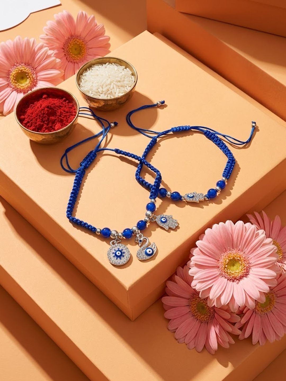 Dhiyona Set Of 2 Blue & Silver Evil Eye Design Bhaiya Bhabhi Rakhi With Roli Chawal Chandan