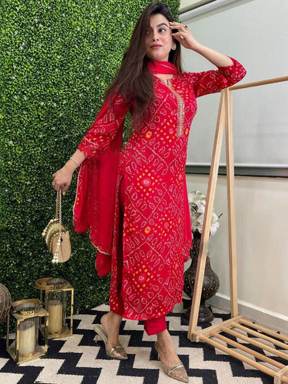 Dhiyona KL Women Bandhani Printed Regular Gotta Patti Kurta with Trousers & With Dupatta